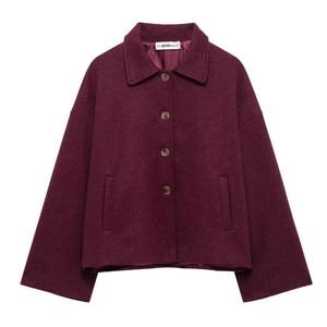 Burgundy short wool blend coat with lapel collar and four buttons in a loose fit