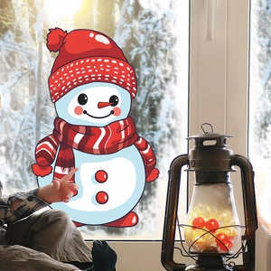Cartoon snowman Christmas window sticker applied to glass with a cozy winter snow background