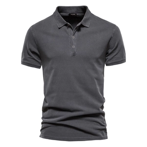 Close-up of charcoal grey cotton polo shirt showing pique texture and collar detail