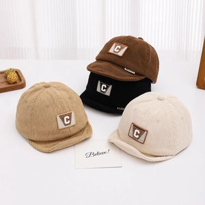 Infant corduroy baseball caps with letter C embroidery in four diverse neutral colors