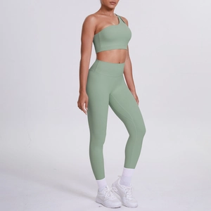 Sage green one-shoulder sports bra and high-waisted yoga leggings two-piece set detail