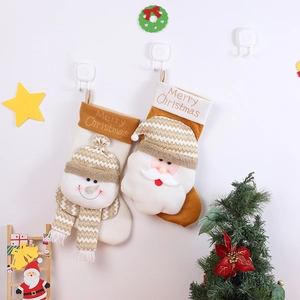 Christmas stockings featuring Santa and Snowman designs for festive holiday decorations