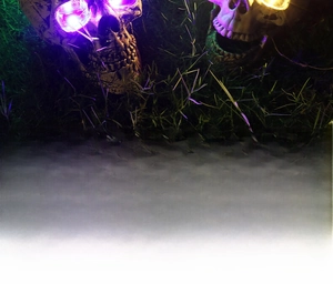 Detail showing glowing Halloween skull and skeletal hands dimensions for outdoor decor