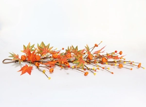 Close-up of 60cm maple leaf garland with mini pumpkins and berries for autumn decor