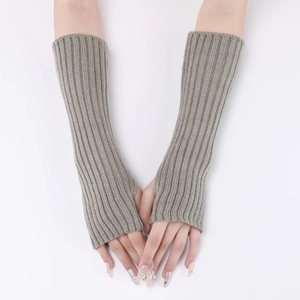 Detail of gray ribbed knit fingerless gloves showing thick texture and arm length