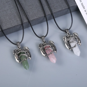 Natural crystal hexagon pendants featuring detailed silver dragon wrap on black cords
