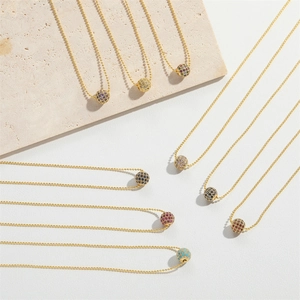 Exquisite gold bead chain necklace featuring colorful round zircon crystal pave ball pendants