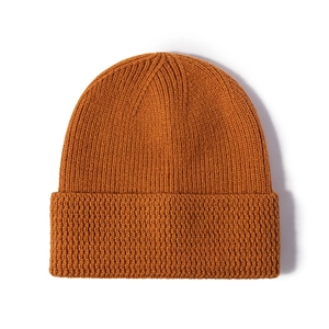 Classic ribbed knit beanie in caramel brown with a wide fold-up cuff for winter warmth