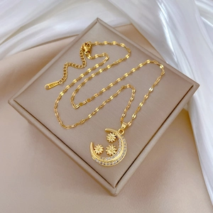 Luxurious stainless steel crescent moon and stars pendant necklace with crystals on silk