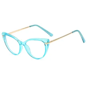 Chic cat-eye glasses frame in transparent green with golden metal temples on white background