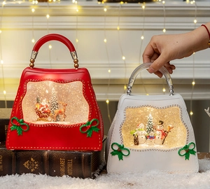 Close-up of vintage Christmas lantern decor with Santa and Snowman in a warm scene
