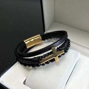 Men's multilayer black leather braided bracelet with a gold cross and magnetic clasp