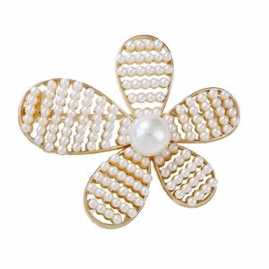 Elegant gold hollow camellia brooch for women featuring white pearls on a white background