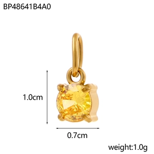 Handmade stainless steel pendant with yellow zircon inlay in a gold claw setting
