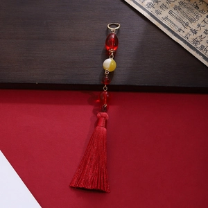 Detail of New Chinese style red tassel earrings with pearls and butterfly metal hooks