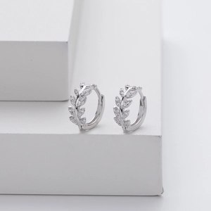 Elegant S925 sterling silver leaf-shaped hoop earrings with sparkling zircon crystals