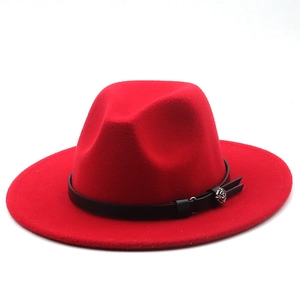Detail of red wool fedora hat featuring black leather band and silver rose metal buckle