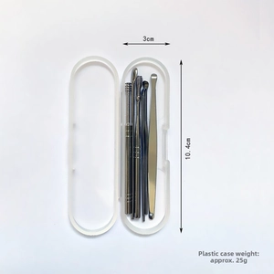 Detailed macro view of 6-piece stainless steel earwax removal set in a compact clear box