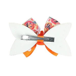 Halloween sequin bow hair clip with pumpkin pattern and silver alligator grip base