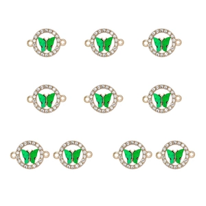 Detailed macro view of 10 green acrylic butterfly connectors with sparkling rhinestones