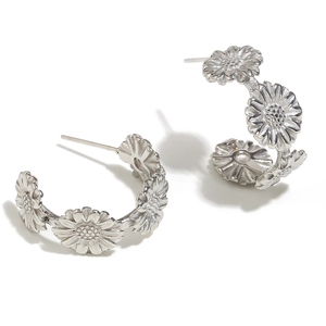 Boucles d'oreilles marguerite minimalistes en acier inoxydable argent sur fond blanc