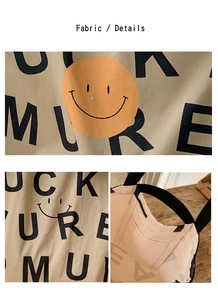 Details einer Canvas-Einkaufstasche mit orangefarbenem Smiley und Innentasche