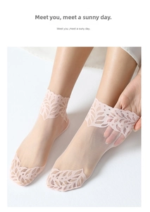 Detail of sheer pink mesh lace ankle socks showing breathable fabric and floral edges