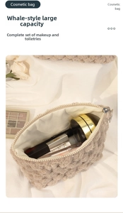 Detail view of large plush checkered cosmetic bag with premium velvet texture and zipper