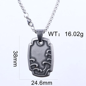 Gros plan du pendentif vague vintage montrant les dimensions 38mm x 24,6mm et le poids 16,02g
