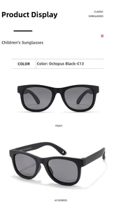 Front and 45-degree angle views of toddler black matte silicone sunglasses with grey lenses