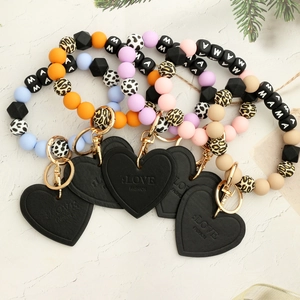 Silicone bead MAMA keychain wristlets with leopard prints and leather heart charms