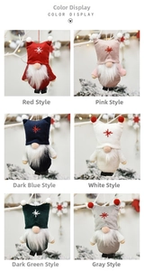 Close-up of six colorful Christmas gnome ornaments with snowflake embroidery and fur beards