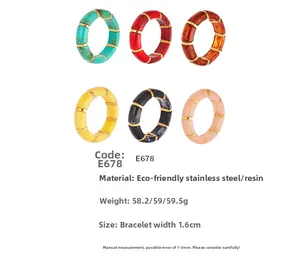 Detail of colorful resin bamboo bracelets with golden stainless steel spacers
