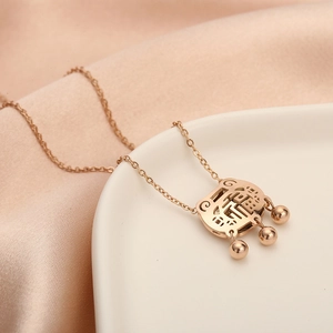 Rose gold stainless steel necklace with hollow Fu lock pendant and small bell charms