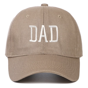 Detailed close-up of khaki cotton baseball cap featuring high-quality DAD letter embroidery