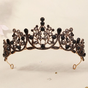 Detail of baroque black rhinestones and grey crystals on vintage bronze bridal crown
