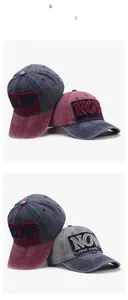 Detail of embroidered letters on washed cotton baseball caps with color-blocking design