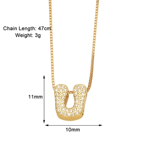 Detail of gold letter U pendant necklace with zircon and product size specifications