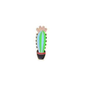 Detailed view of colorful enamel cactus pin in a pot with vibrant green and pink tones