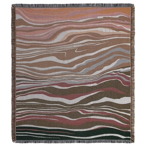 Bohemian woven blanket with wave pattern, earth tones and decorative fringe edges