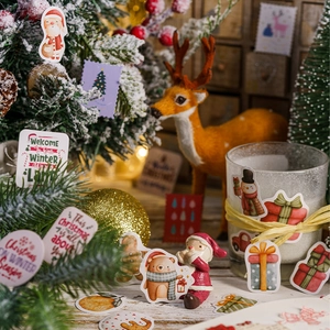 Cute Christmas themed boxed stickers featuring Santa reindeer and bears for DIY journaling