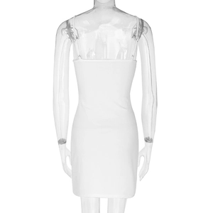 Close-up of white ribbed fabric texture on a slim-fit backless bodycon dress
