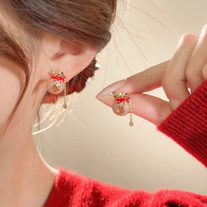 Boucles d'oreilles élégantes style chinois avec sac porte-bonheur, cristaux et pompons