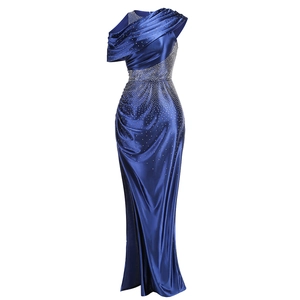 Detail of royal blue satin evening gown with sparkling rhinestones and one-shoulder cut