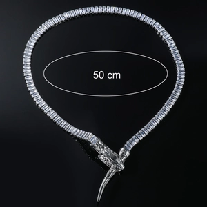 Silver snake-shaped necklace with cubic zirconia, 50 cm chain length on black background