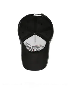 Internal details of washed cotton baseball cap featuring reinforced seams and logo lining