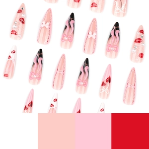 Pink and red stiletto press-on nails with 3D bows, leopard print, and heart patterns