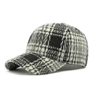Classic houndstooth baseball cap with black and white plaid wool blend fabric