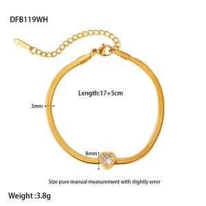 Detail of 18k gold plated snake chain bracelet with heart zircon and steel tag