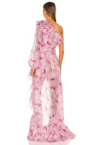 Detail of pink floral one-shoulder dress with ruffled asymmetric hem and airy texture